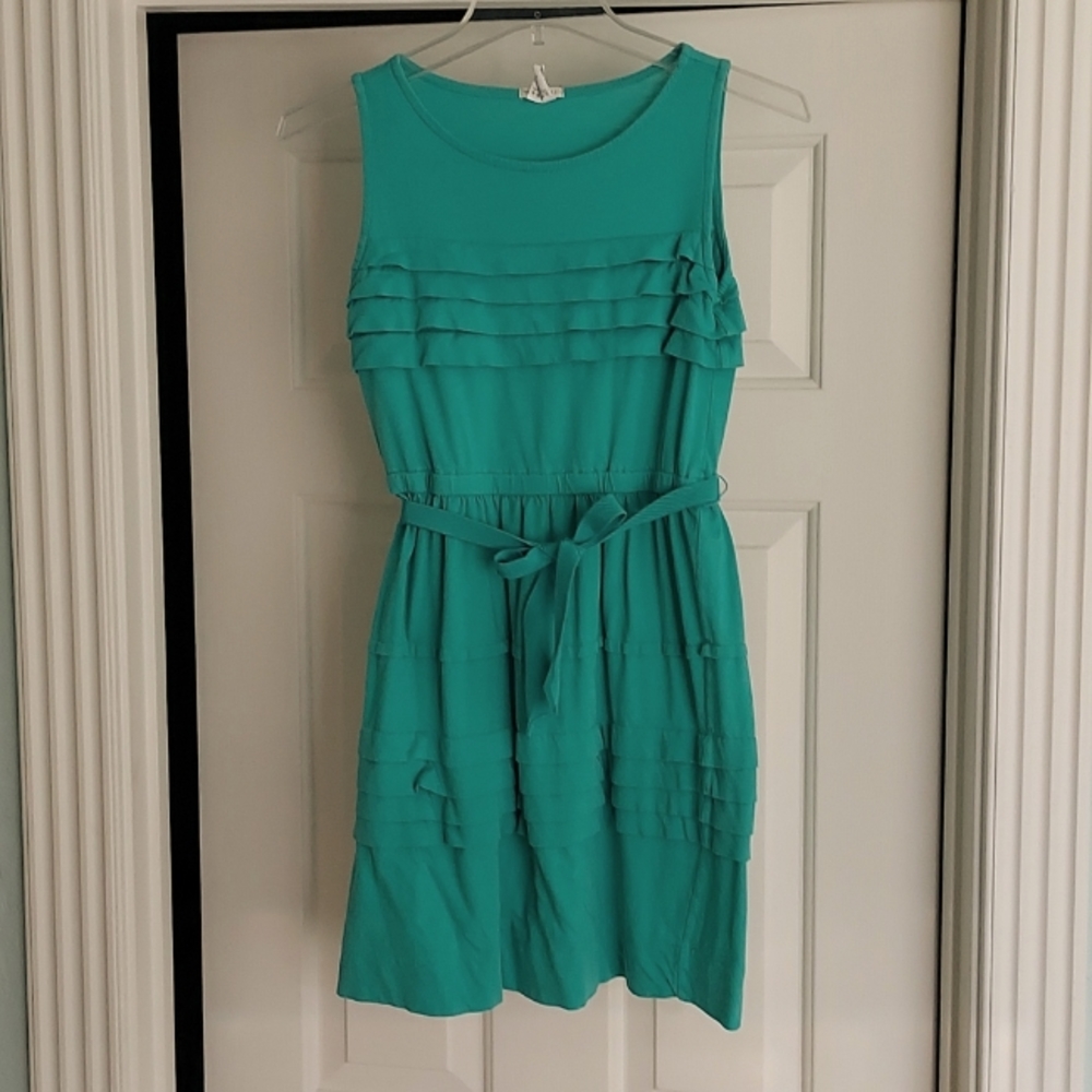 Girl's teal sleeveless knit dress